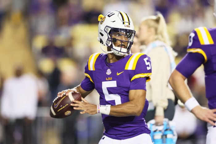 Nov 18, 2023; Baton Rouge, Louisiana, USA; Heisman Trophy candidate LSU Tigers quarterback Jayden Daniels (5) warms up before their game against the Georgia State Panthers at Tiger Stadium.